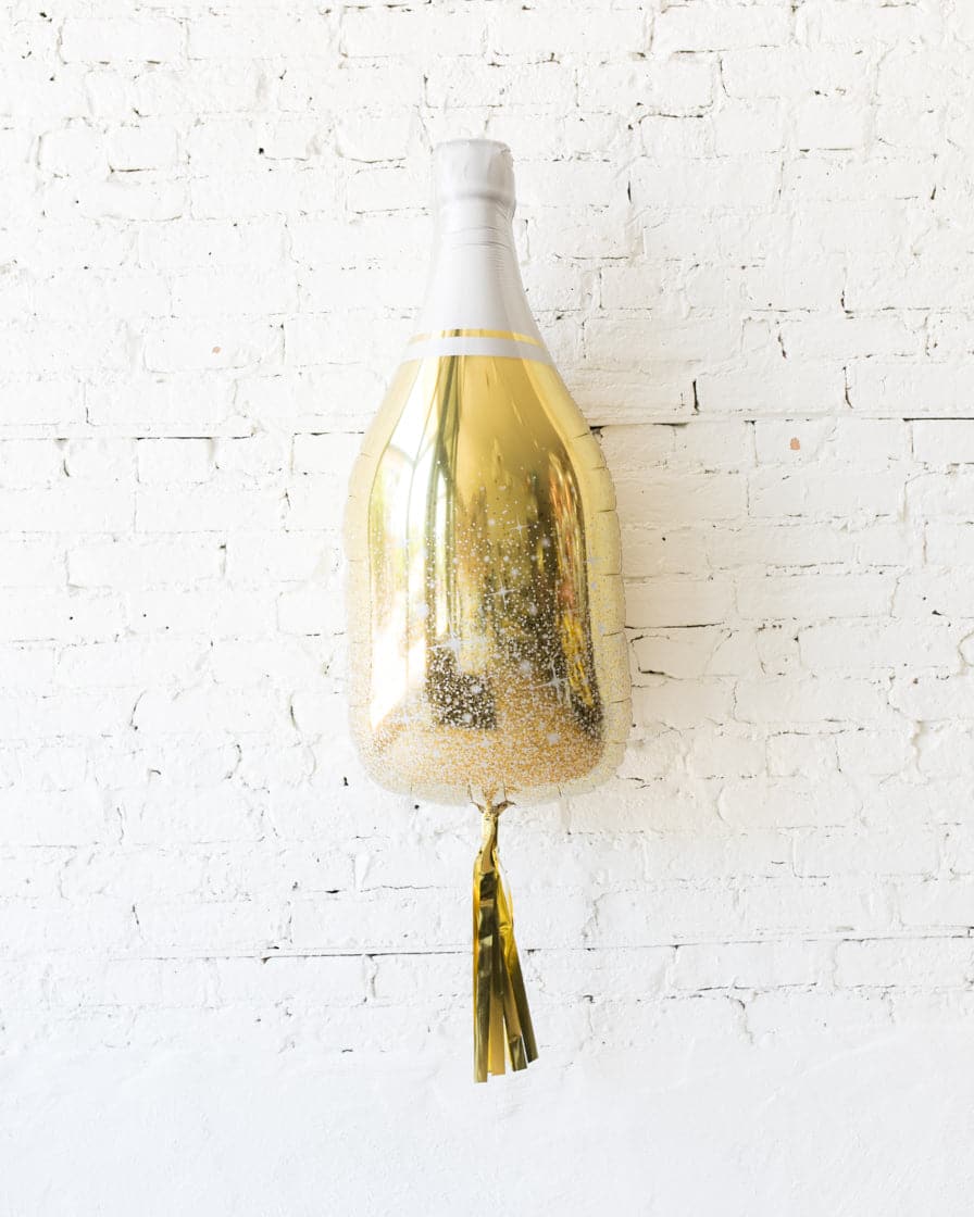 36in Gold Champagne Bottle Foil Balloon with Gold Skirt | Purchase 36in Gold Champagne Bottle Foil Balloon with Gold Skirt | Purchase
